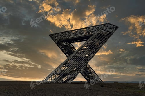 Preview: Beautiful view of the Saar Polygon building under the cloudy sky during sunset in Saarland, Germany