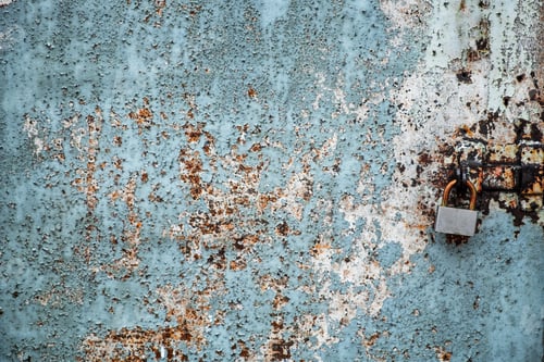 Preview: Old rusty door with padlock