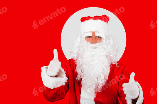 Preview: Santa Claus on red backdround makes thumbs up