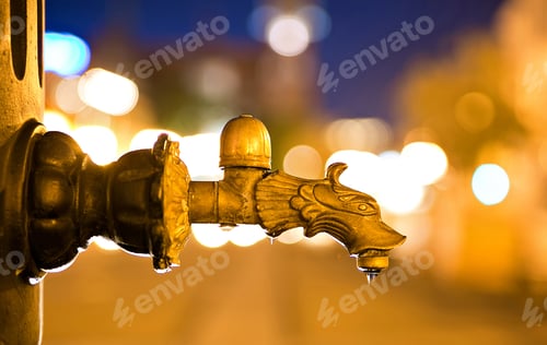Preview: City tap with dripping water