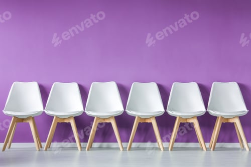 Preview: Row of chairs against wall