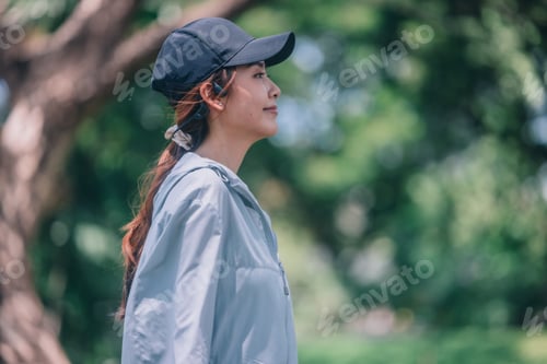 Preview: Stylish female runners in modern attire, discover serenity. Reenergize amid jogging the parkway.