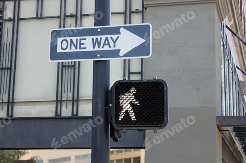 Preview: 'One way' traffic sign on a metal pole