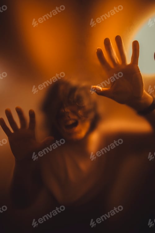 Preview: Scary picture of hands behind glass, horror ghost behind door, Halloween concept