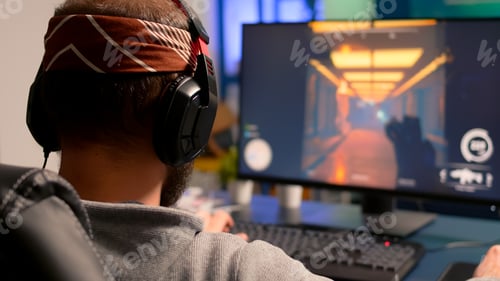 Preview: Pro gamer playing on powerful computer shooter video game