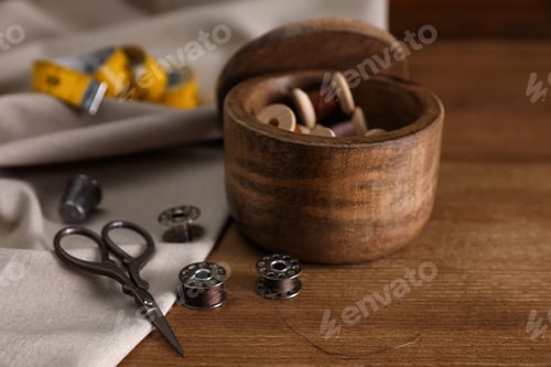 Preview: Set of sewing supplies and accessories on wooden table