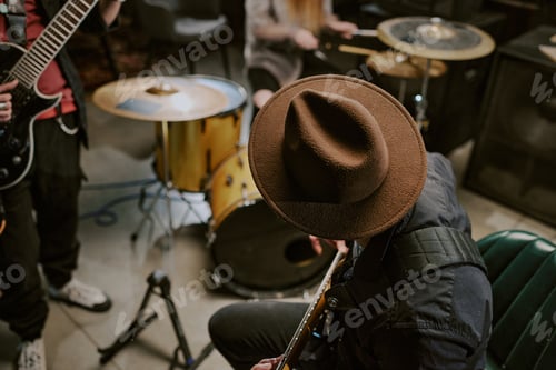 Preview: Band Practicing Music Together in Recording Studio