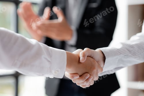 Preview: Business investor group holding hands.