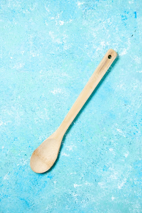 Preview: top view wooden spoon on table free space
