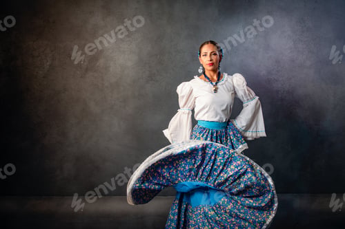 Preview: A woman in a blue skirt is dancing