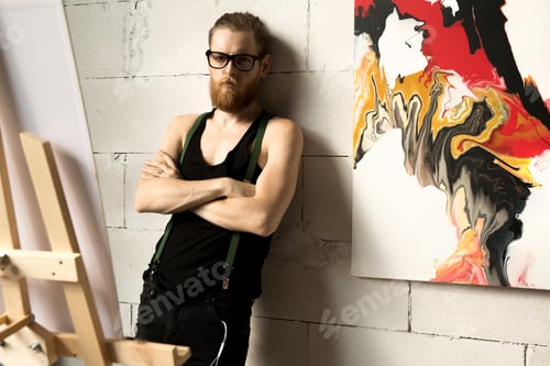 Preview: Pensive Male Artist in Studio