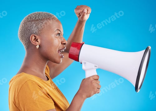 Preview: Black woman, megaphone and protest in studio, shout or profile with fist in air for human rights by