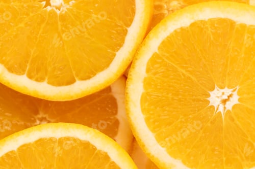 Preview: Micro close up of sliced orange and copy space