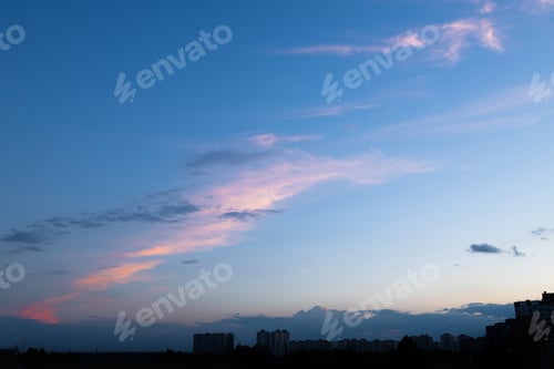 Preview: Cloudscape, Colored Clouds at Sunset over the city in the evening.
