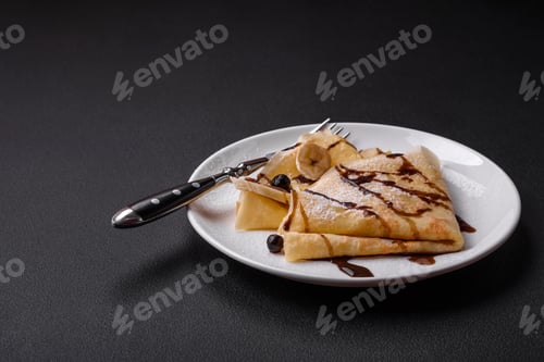 Preview: Delicious fresh baked pancakes with honey and fruits on a concrete background