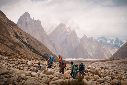 Preview: Group of people trekking on baltoro glacier trail in karakoram, pakistan. Baltoro