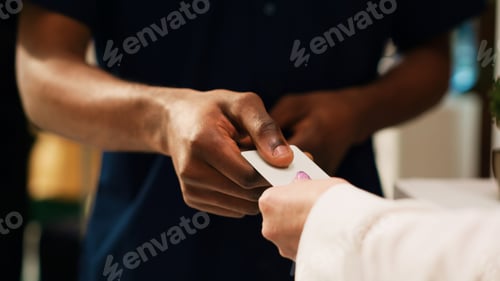 Preview: Hotel guest receiving access key card