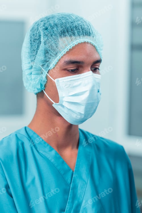 Preview: Portrait shot of a young dentist in the dentistry room