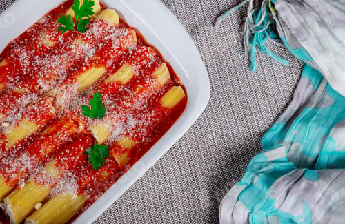Preview: Cannelloni with ricotta baked in tomato sauce Italian cuisine