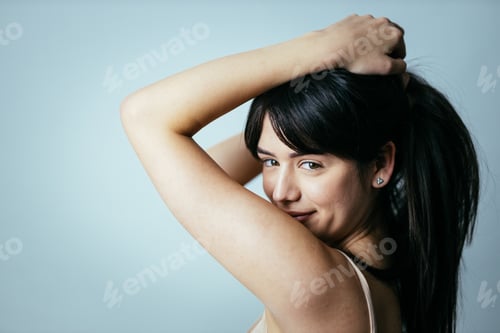 Preview: Beautiful girl posing in studio for a "body positivity" photo session