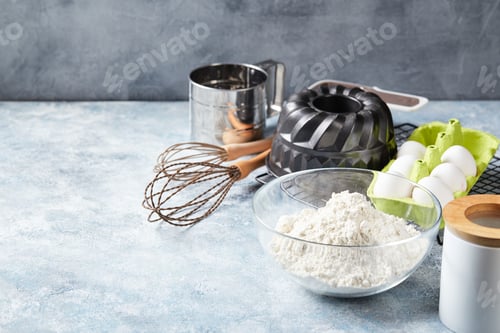 Preview: Baking ingredients and utensils, flour, eggs, baking dish.