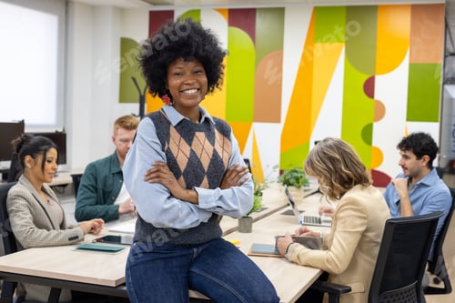 Preview: Confident black woman leading diverse business team meeting