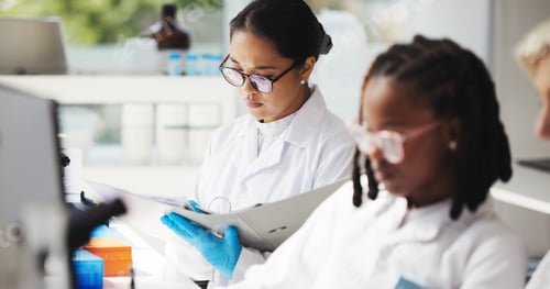 Preview: Medical research, scientists and women with document, lab and info for treatment of disease or cure