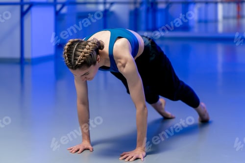 Preview: in studio of spiritual development master class in yoga middle-aged girl in blue top and pants in a