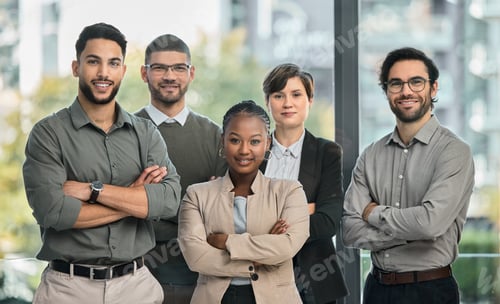 Preview: Portrait of a group of businesspeople with arms folded at the office