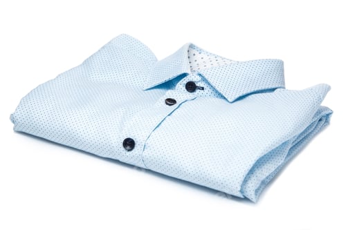 Preview: Folded light blue dress shirt with dots