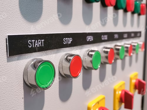 Preview: Close up image a row pilot lamp, push button and selector switch mount on electrical cabinet door.