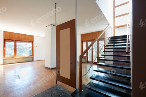 Preview: Empty living room with black marble staircase, apartment interior