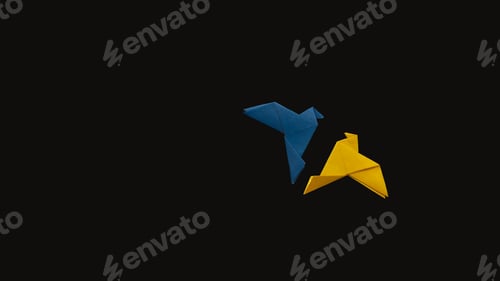 Preview: banner two doves origami paper in yellow and blue, in colors of Ukrainian flag on black background