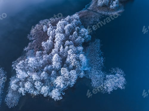 Preview: Frosty island in the blue lake, cold winter morning picture
