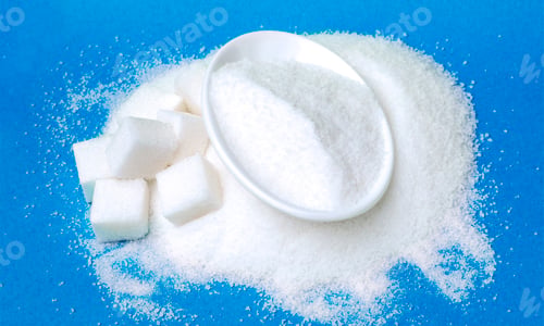 Preview: Granulated and lump sugar on blue background