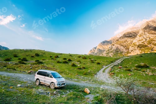 Preview: SUV Car On Off Road In Summer Mountains Landscape. Active Lifest