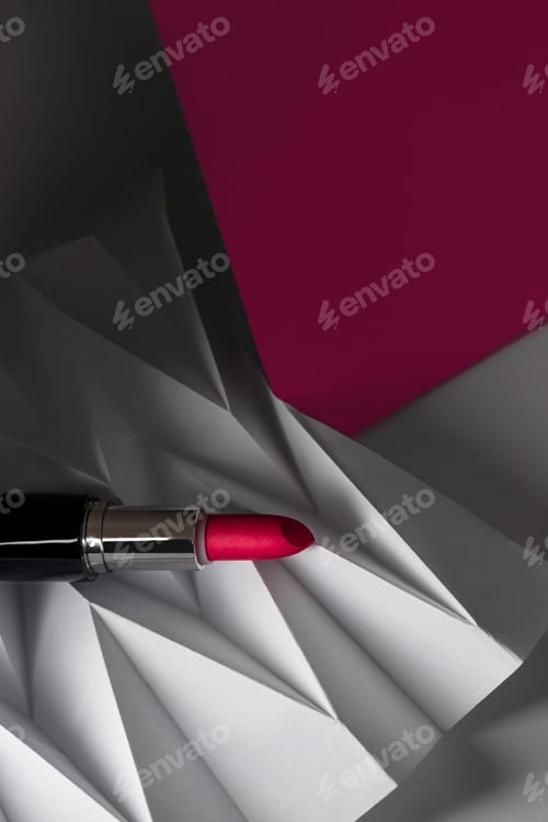 Preview: Pink lipstick on raised white chevron. Product and make up contemporary concept
