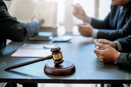 Preview: Business lawyer working about legal legislation in courtroom to help their customer.