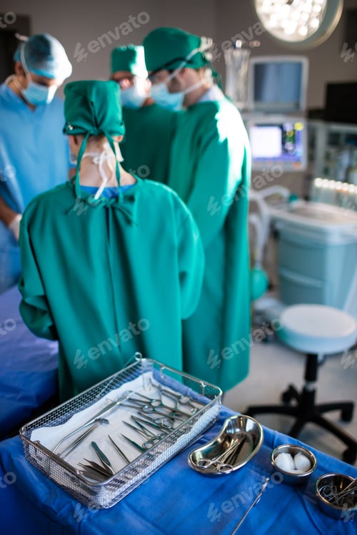 Preview: Surgeons Prepare Medical Tools in Operating Room
