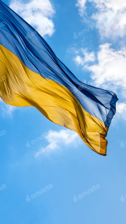 Preview: Flag of Ukraine flutters in blue sky. Large yellow blue Ukrainian national state flag. War