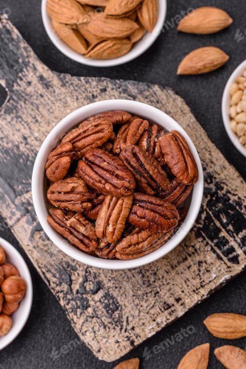 Preview: Nut, pecans in a ceramic bowl, an ingredient in vegan food