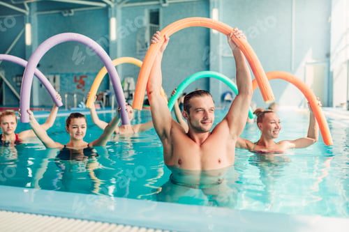 Preview: Aqua aerobics exercises, women with male trainer