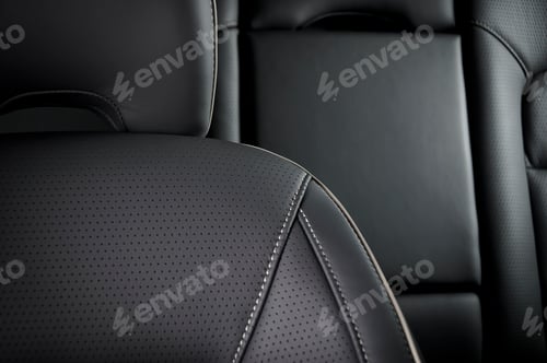 Preview: Modern sport car black leather interior. Part of leather car seat details.