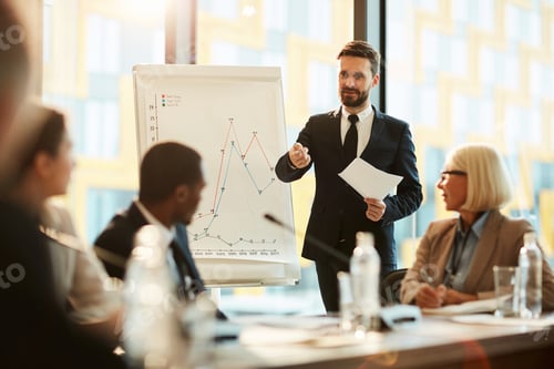 Business Presentation with Charts in Modern Office Setting