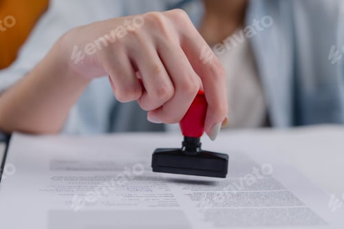 Preview: Businesswoman authorizing contract notary rubber stamp, certification business law, finance
