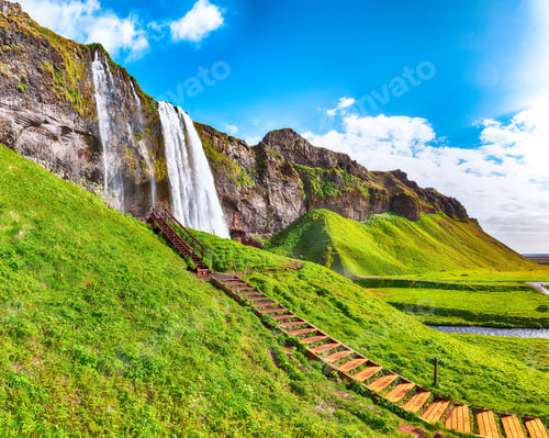 Preview: Fantastic Seljalandsfoss waterfall in Iceland during sunny day.