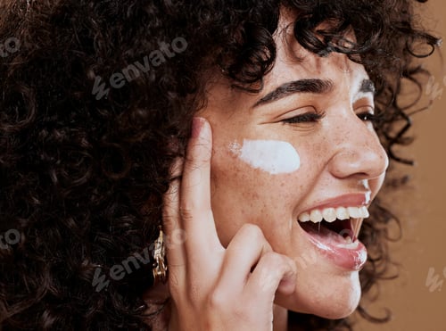 Preview: Cream, woman and skincare for wellness, natural beauty and confident on brown studio background. Co