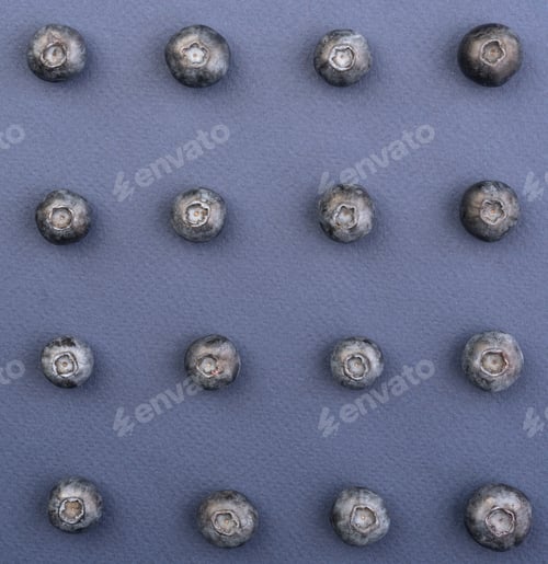 Preview: Blueberries isolated over blue background table.