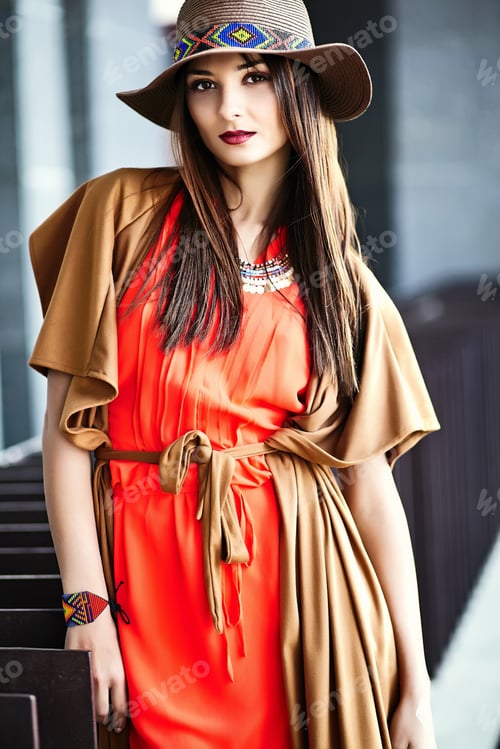 Preview: Young stylish woman posing in the street in summer clothes