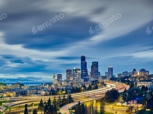 Preview: Traffic light trails and cityscape at dusk, Seattle, Washington State, USA